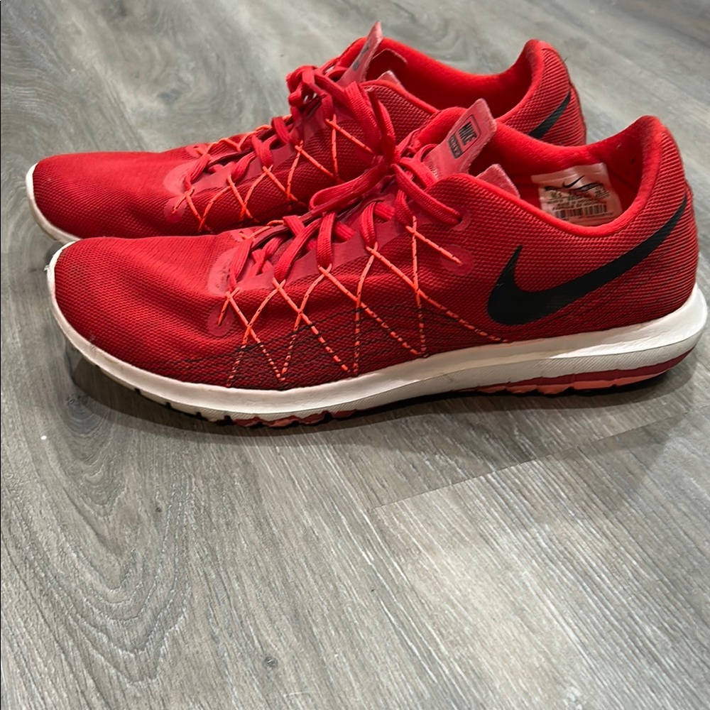 Men’s red Nike shoes size 10.5